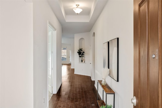 corridor with a tray ceiling