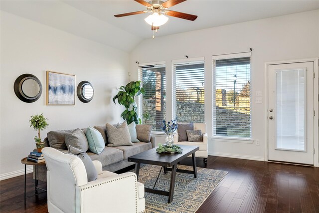 living room with vaulted ceiling, dark wood-type flooring, and ceiling fan