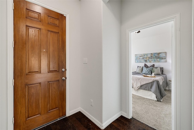 entrance foyer featuring dark hardwood / wood-style flooring