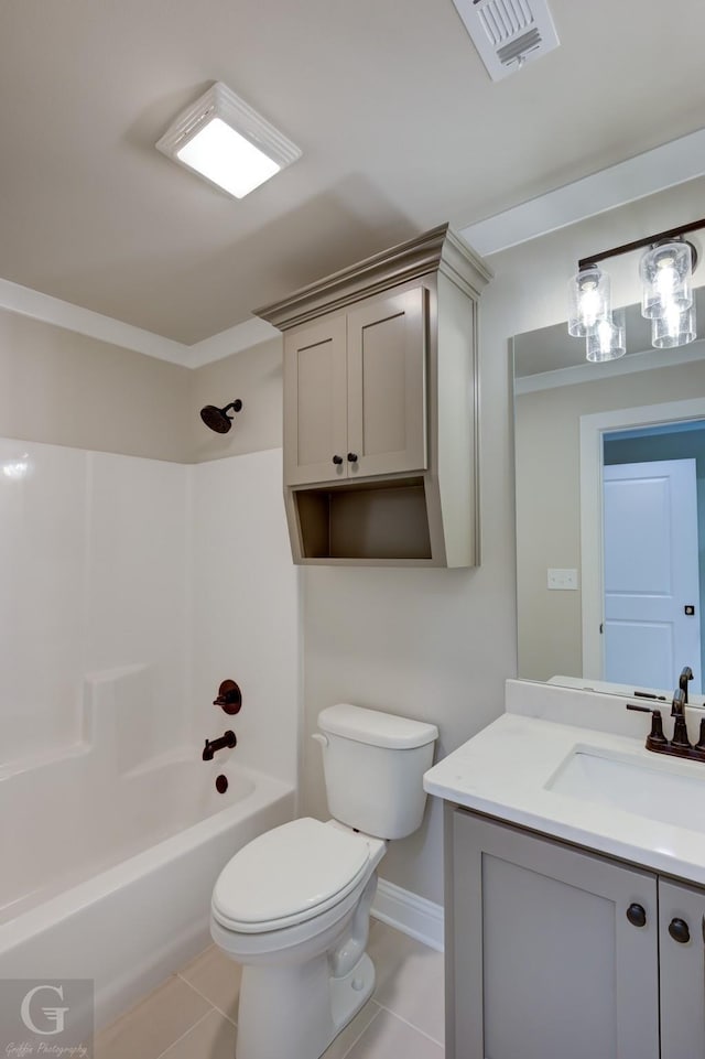 full bathroom featuring washtub / shower combination, vanity, toilet, and tile patterned flooring