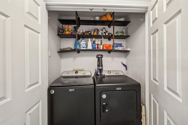 laundry area featuring washing machine and dryer