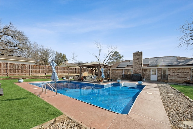 view of swimming pool featuring a gazebo, a yard, and a patio area