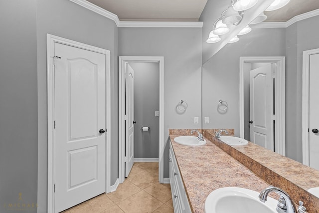 bathroom with tile patterned flooring, vanity, and crown molding