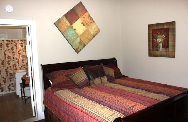 bedroom featuring hardwood / wood-style floors