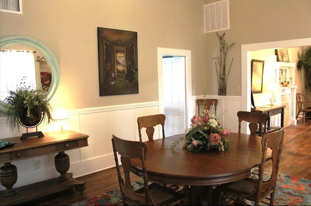 dining area featuring dark hardwood / wood-style flooring