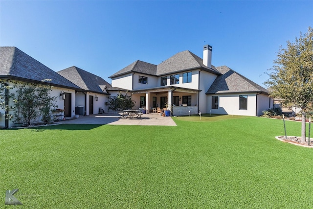 back of house featuring a patio area, cooling unit, and a lawn