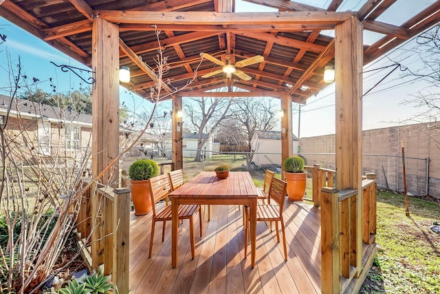 wooden terrace featuring a gazebo