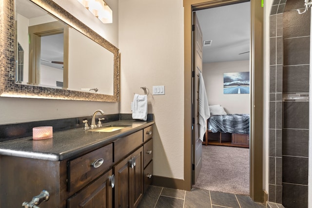 bathroom featuring tile patterned floors and vanity