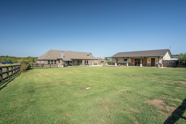 view of yard with a fenced backyard and a patio