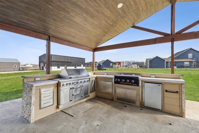 view of patio with exterior kitchen