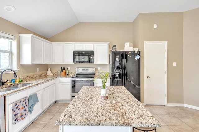 kitchen with black appliances, a center island, white cabinets, and sink