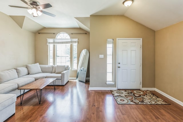 entryway featuring ceiling fan, dark hardwood / wood-style flooring, and lofted ceiling