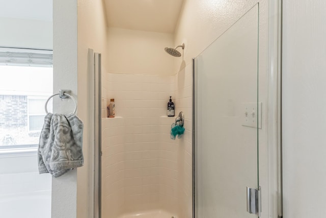 bathroom with an enclosed shower