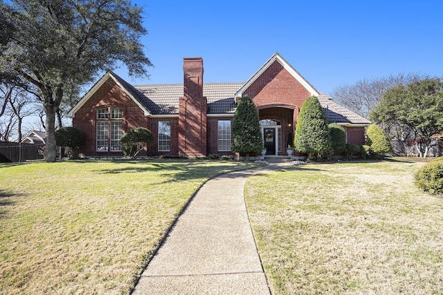 view of front of property with a front lawn