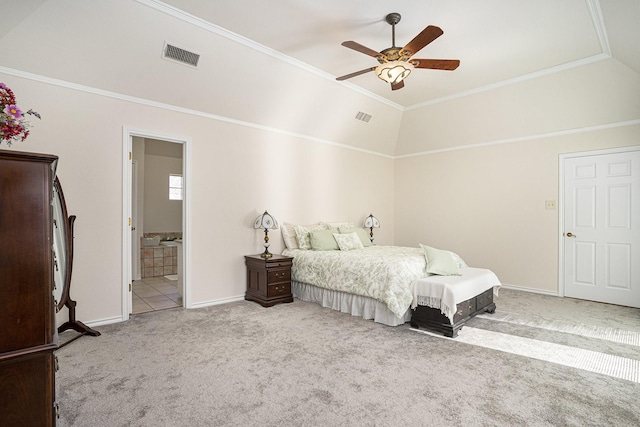 carpeted bedroom featuring vaulted ceiling, ornamental molding, and ceiling fan