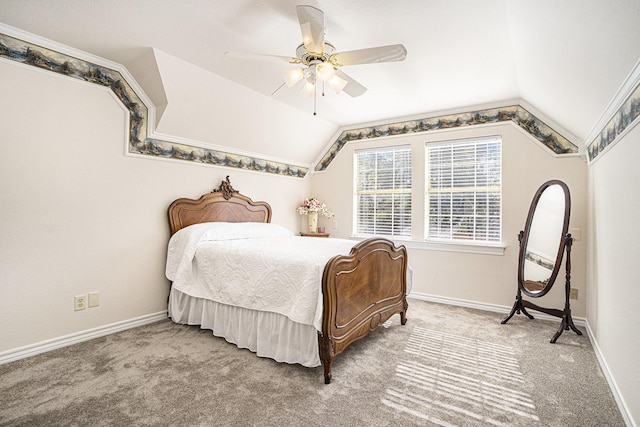 bedroom with lofted ceiling, carpet floors, and ceiling fan