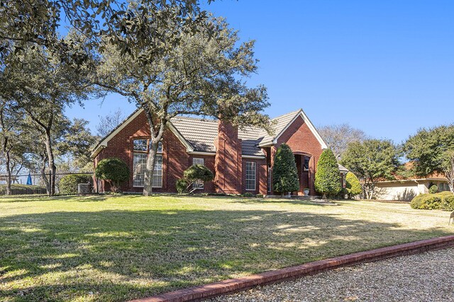 view of property with a front lawn