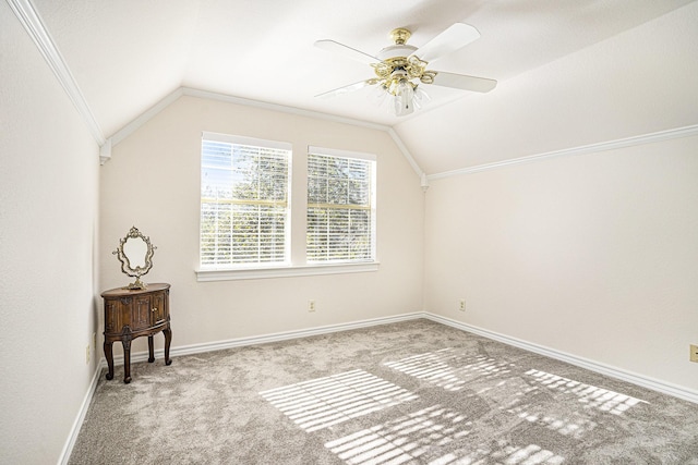 additional living space featuring lofted ceiling, light colored carpet, and ceiling fan