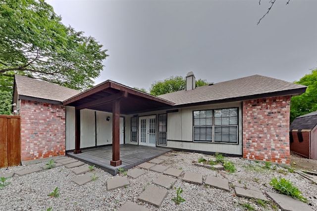 back of property with french doors