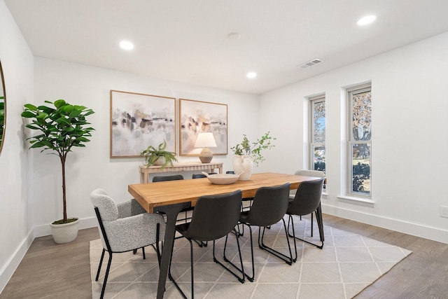 dining area featuring light wood-type flooring