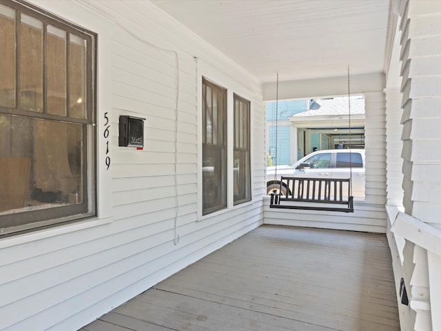 deck with covered porch