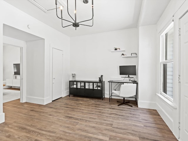 office space with a chandelier and hardwood / wood-style floors