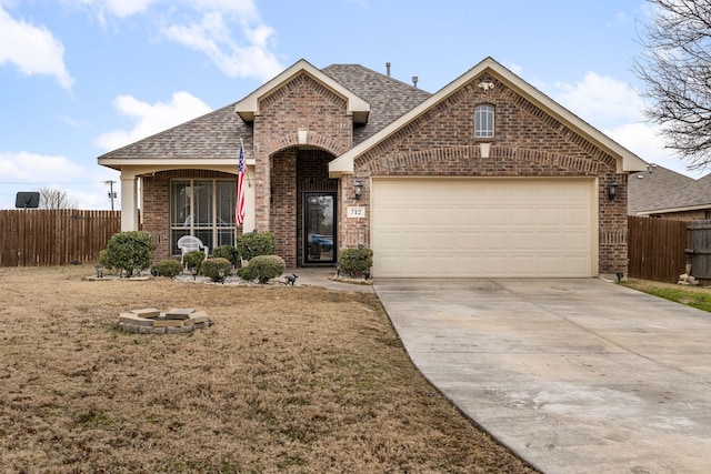 view of front of property with a garage