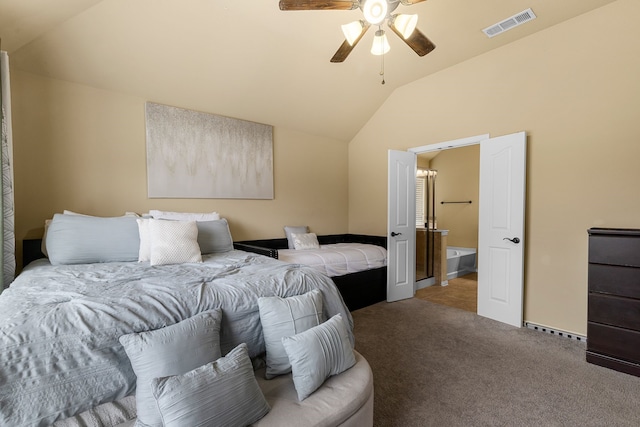 carpeted bedroom featuring ceiling fan and vaulted ceiling