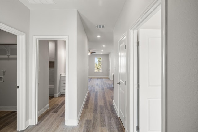 corridor featuring light hardwood / wood-style flooring