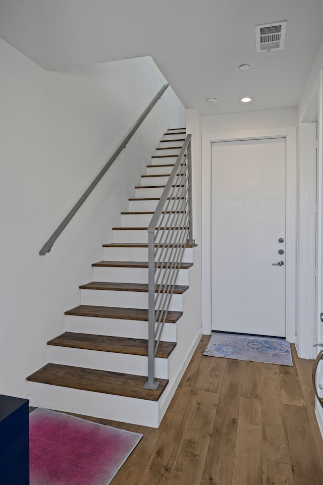 foyer featuring wood-type flooring