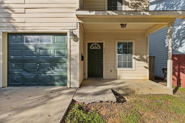 property entrance featuring a garage