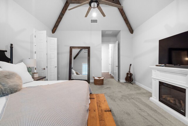 bedroom with light carpet, beamed ceiling, high vaulted ceiling, and ceiling fan