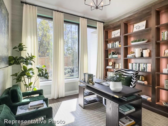 office area with a notable chandelier