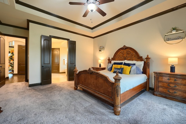 bedroom with carpet floors, ceiling fan, and ornamental molding