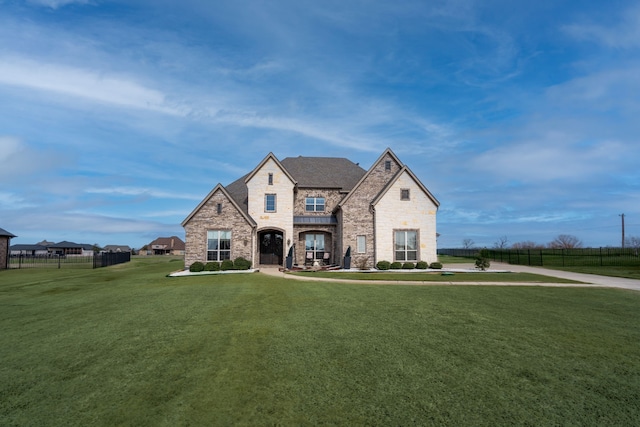 view of front facade with a front yard