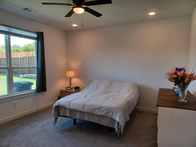 carpeted bedroom featuring ceiling fan