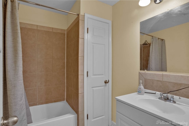 bathroom with shower / bath combination with curtain and vanity