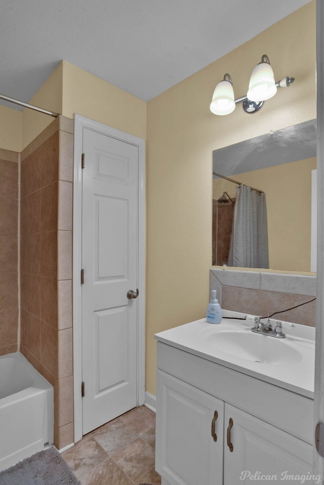 bathroom with vanity and shower / bathtub combination with curtain