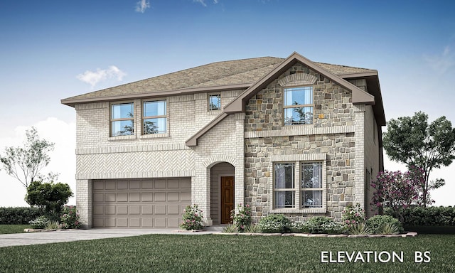 view of front of home featuring a garage and a front lawn