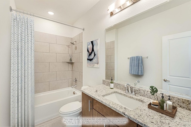 full bathroom featuring tile patterned floors, toilet, vanity, and shower / bath combo