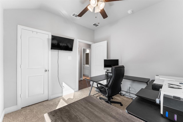 office with ceiling fan, light colored carpet, and vaulted ceiling