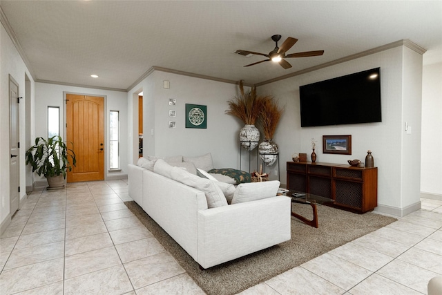 tiled living room featuring ceiling fan and ornamental molding