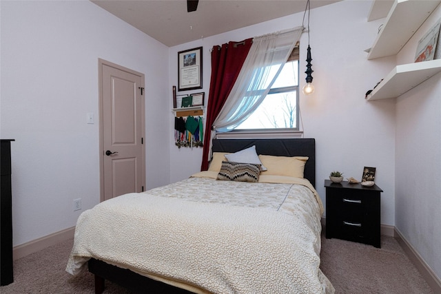 bedroom featuring ceiling fan and carpet flooring