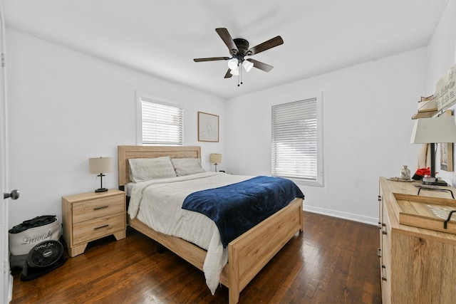 bedroom featuring ceiling fan and dark hardwood / wood-style flooring