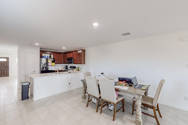 dining space featuring sink