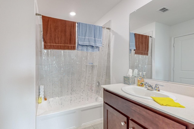 bathroom featuring tile patterned floors and vanity