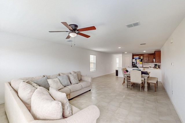 living room with ceiling fan