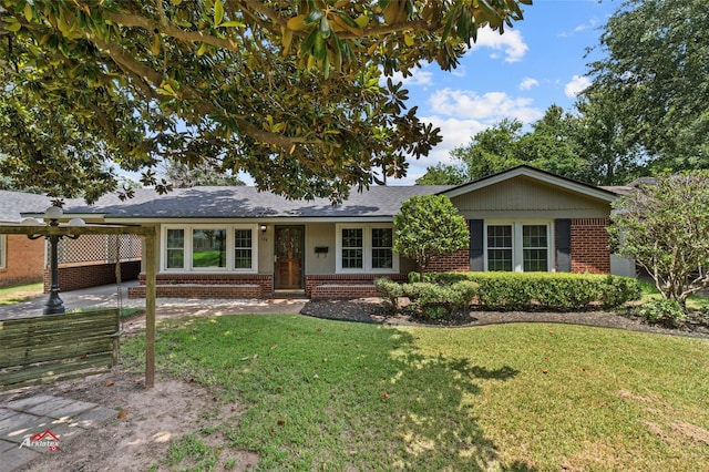 ranch-style house with a front yard