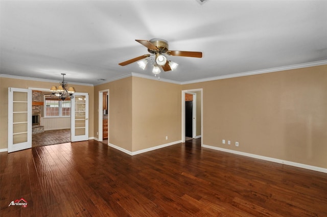 unfurnished room featuring crown molding, french doors, and dark hardwood / wood-style flooring