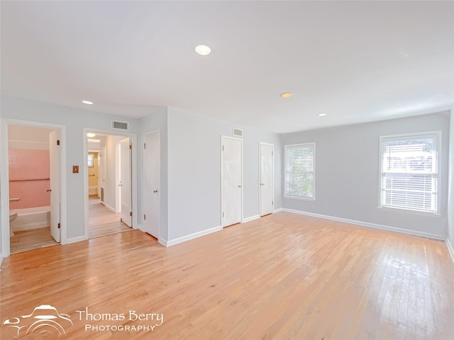 empty room with light wood-type flooring